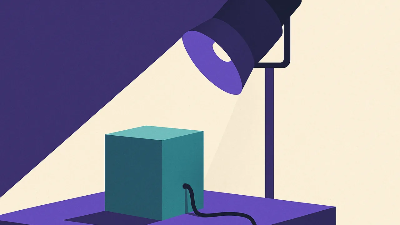 a bright spotlight on an empty pedestal, a coiled power cable dangling off the side